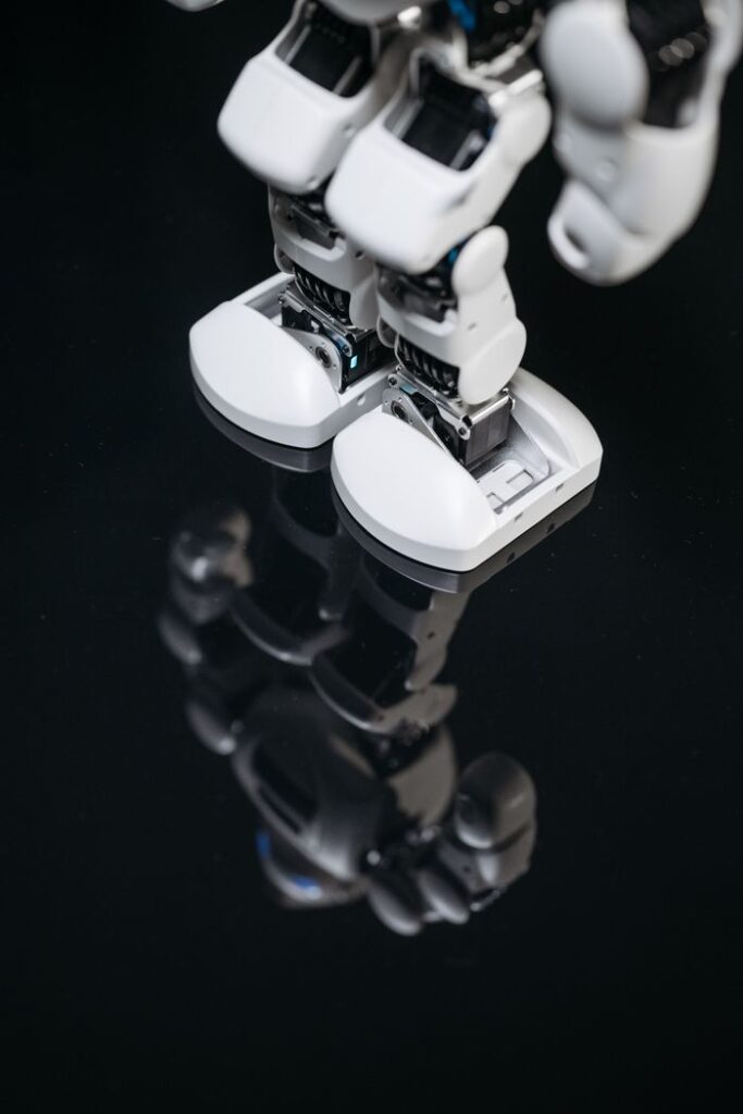 What Google Actually Sees When It Crawls a New Blog (A Beginner's Breakdown) High-tech robot feet reflecting on a glossy surface, showcasing futuristic design.